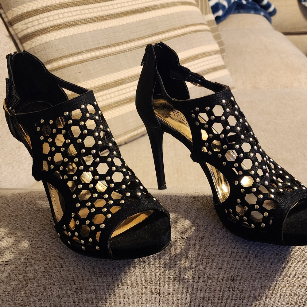 Jennifer Lopez Silver and Black Stiletto Heels with Intricate Cut-Out Design